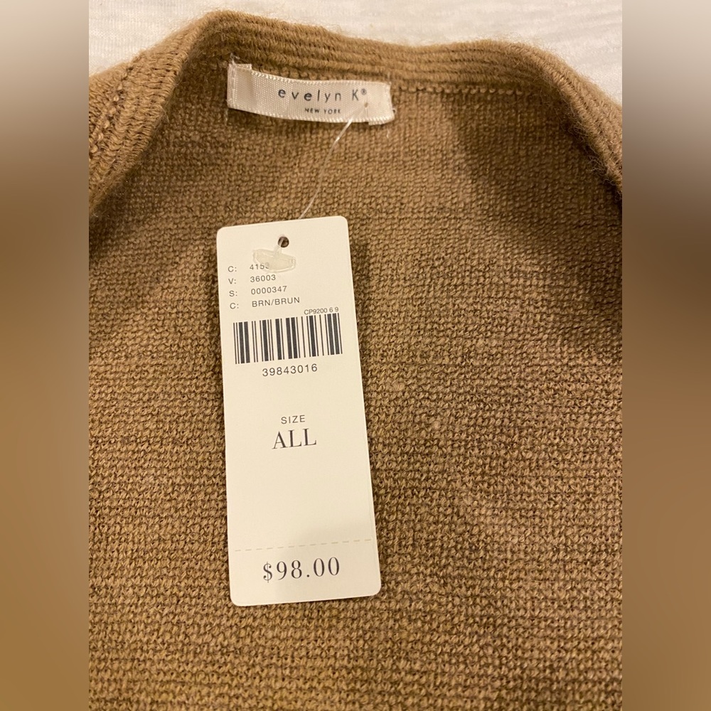 Anthropologie ruffled hemmed vest